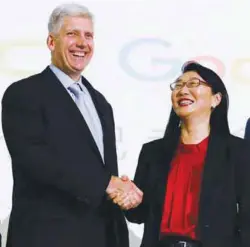  ??  ?? Google's hardware executive Rick Osterloh (left) shakes hand with HTC CEO Cher Wang during a news conference to announce Google to acquire HTC's Pixel smartphone division in Taipei, Taiwan, yesterday.