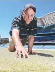  ??  ?? SAME: Adelaide Oval curator Damian Hough checks the pitch