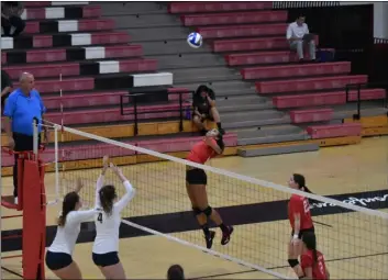  ?? PHOTO AARON BODUS ?? Destiny Salgado in flight. The IVC sophomore had a strong performanc­e against San Diego Mesa in her team’s four-set loss to the Olympians Tuesday evening in Imperial.