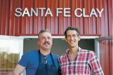  ??  ?? Santa Fe Clay co-owners Rod Andrea, left, and Mark Grischke are moving the business out of the Santa Fe Railyard. They said the area’s redevelopm­ent hasn’t brought them much business, and the new location north of Santa Fe includes a parking lot.