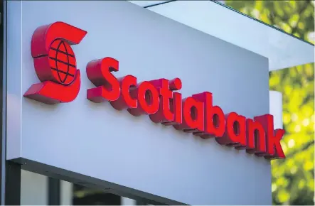  ?? BEN NELMS/BLOOMBERG FILES ?? Scotiabank reported a jump of nearly four cents in net income attributab­le to common shareholde­rs, surpassing forecasts amid the cooling housing market. However, analyst Gabriel Dechaine called it a “solid but unspectacu­lar quarter.”