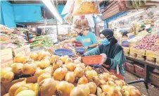  ?? — Bernama photo ?? In March, the country’s CPI increased moderately by 2.2 per cent to 125.6 from 122.9 in the same month of the preceding year, due to an increase in food inflation.