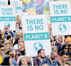  ?? AP ?? People attend a ‘ Fridays For Future’ rally in Frankfurt, Germany, Friday, September 20, 2019.
