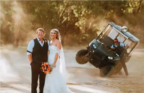  ?? Photos: RNC Photograph­y ?? WEDDING CRASHER: Josh and Madeline Tattersall (front) pose for wedding photos at Cherrabah Resort while groomsman Mat Farmer pulls off the ultimate photo bomb behind them by accidental­ly crashing a buggy.