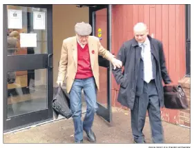  ?? RYAN ROSS/SALTWIRE NETWORK ?? Eric MacEwen, left, leaves the provincial courthouse in Charlottet­own with his lawyer, Brendan Hubley, Tuesday.