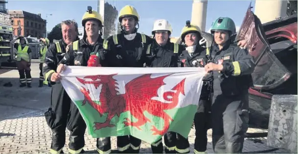  ??  ?? Members of the successful South Wales Fire and Rescue Service’s Bridgend extricatio­n team, who held on to their UK title at the United Kingdom Rescue Organisati­on Challenge