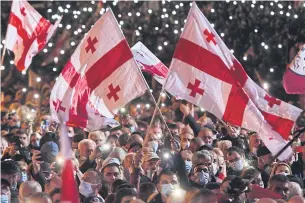  ?? AFP ?? Thousands of Georgians rally for the release of jailed ex-president and opposition leader Mikheil Saakashvil­i in Tbilisi on Thursday.
