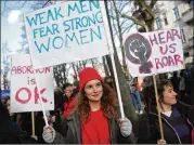  ?? SEAN GALLUP / GETTY ?? Women attend a march for women’s rights, marking Internatio­nal Women’s Day in Berlin, Germany, Thursday. Millions of women across the world, including the Philippine­s and Pakistan, marched.