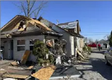  ?? Patrick Orsagos/Associated Press ?? Joe Baker's damaged home in Valleyview, Ohio, on Saturday. Thursday night’s storms left trails of destructio­n across parts of Ohio, Kentucky, Indiana and Arkansas.