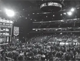  ?? TERI PECOSKIE, THE HAMILTON SPECTATOR ?? Mackenzie Entwistle’s supporters were blown away when they got their first look at the pageantry of the draft at Chicago’s United Center.