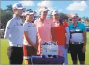  ?? DOUG FERGUSON — THE ASSOCIATED PRESS ?? LPGA golfers, from left, Sung Hyun Park, So Yeon Ryu, Lexi Thompson, Shanshan Feng and Brooke Henderson pose before a glass case, reflecting the $1 million cash bonus up for grabs this week at the Tour Championsh­ip.
