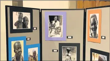  ??  ?? ■ African Mothers, an exhibition of paintings by Emmanuel Eyomu, a young Ugandan artist, including photograph­s taken by Margaret Stevens, is currently on show at Loughborou­gh’s All Saints Church, Steeple Row.