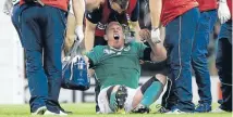  ?? PHOTO: REUTERS ?? Ireland captain Paul O’Connell grimaces in pain before leaving the field with a leg injury.