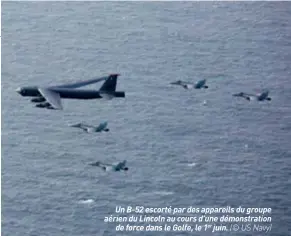  ??  ?? Un B-52 escorté par des appareils du groupe aérien du Lincoln au cours d’une démonstrat­ion de force dans le Golfe, le 1er juin. (© US Navy)