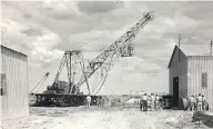  ?? (PHOTO: NUTRIEN) ?? This photo shows the dismantlin­g of Palmer No. 2 rig after completion of freeze-hole drilling in 1955.