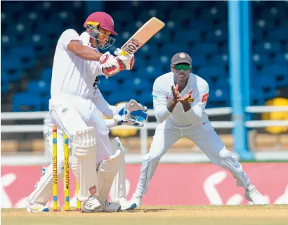  ?? AFP ?? Kieran Powell showed good form to take West indies towards an unassailab­le lead on the fourth day of the first test against lanka. —