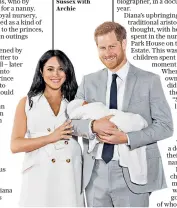  ??  ?? A very modern couple: the Duke and Duchess of Sussex with Archie