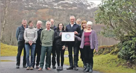  ??  ?? Glen Creran community members and Argyll and the Isles Coast and Countrysid­e Trust celebrate the Heritage Lottery award.