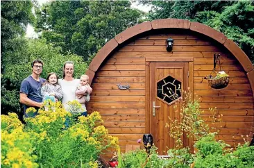  ?? ?? Sebastian Zuefle and partner Kathryn McConnell, of Marlboroug­h Wine Barrel Cabins, offer accommodat­ion that’s very appropriat­e for its location.