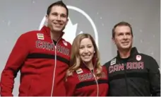  ?? JOHN WOODS/THE CANADIAN PRESS ?? John Morris, left, Kaitlyn Lawes and coach Jeff Stoughton will represent Canada in the first Olympic mixed doubles curling event in Pyeongchan­g.