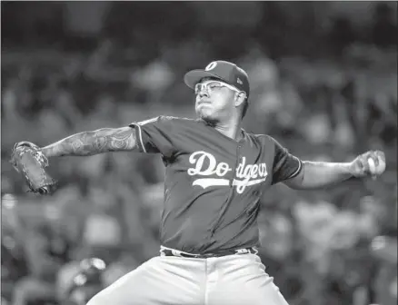  ?? Robert Gauthier Los Angeles Times ?? THE DODGERS have limited left-hander Julio Urias’ innings in the first half in hopes of using him as an extra starting pitcher late in the regular season and in the playoffs. Urias has primarily worked out of the bullpen, making only five starts in 20 appearance­s.