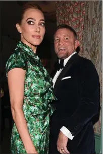  ?? ?? LOCK, STOCK: Film director Guy Ritchie and wife Jacqui Ainsley were all smiles at the Mayfair bash