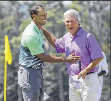  ?? CURTIS COMPTON / CCOMPTON@AJC.COM ?? Joined by Tiger Woods for his final Masters practice round, Ben Crenshaw, 63, admitted, “I probably should’ve stepped down a few years ago.”