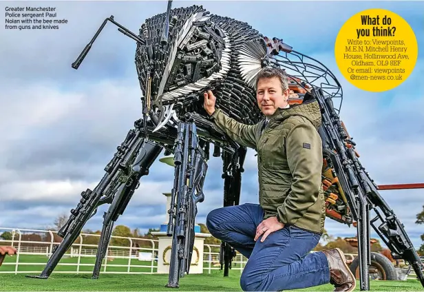  ?? ?? Greater Manchester Police sergeant Paul Nolan with the bee made from guns and knives