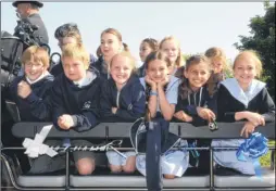  ?? Picture: Gary Browne FM2688350 ?? Year six leavers arriving at school by horse-dawn dray