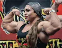  ?? Agency (ANA)
| AP
African News ?? FEMALE bodybuilde­r Natalyia Kuznetsova shows off her muscles.