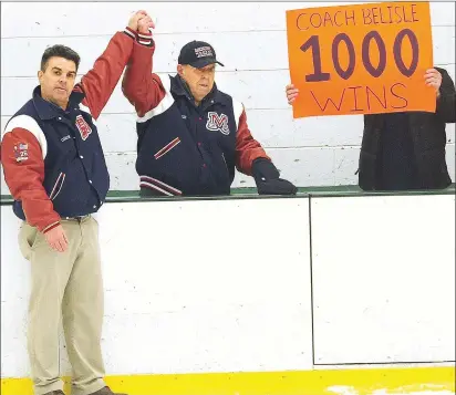  ?? Photos by Ernest A. Brown ?? Mount St. Charles hockey coach Bill Belisle (above, center) became the first schoolboy coach to reach 1,000 wins when the Mounties trounced Smithfield in February. Former Patriot running back Patrick Pass (below, left) is leaving his indelible mark on...