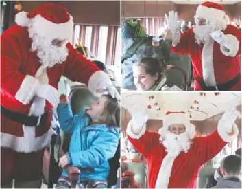  ?? [LIZ BEVAN / THE OBSERVER] ?? Santa Claus made a well received appearance on the Waterloo Central Railway steam train in St. Jacobs last weekend. The train cars were full for the first Santa train ride of the season with families sipping hot chocolate and munching on snacks.