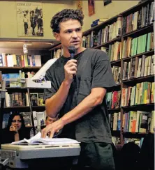 ?? Susan Ragan / Associated Press 2001 ?? After publishing his new novel, left, in the United States, author Dave Eggers says he is pleased with the quality and costs.