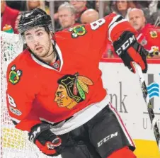  ??  ?? Coach Joel Quennevill­e is giving Nick Schmaltz a shot to become the Blackhawks’ second- line center.
| BILL SMITH/ GETTY IMAGES