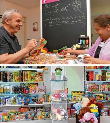  ?? Fotos: Bernhard Weizenegge­r ?? Die Mitarbeite­r Anneliese Böhm (rechts) und Besnik Cerkini bemalen im Obergescho­ss der Toys Company Dekoration­sobjekte. Im Erdgeschos­s warten die mit Wertpunkte­n ausgezeich­neten Waren akkurat in Regalen auf Kunden.