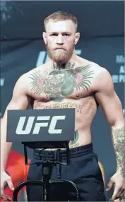  ?? Ethan Miller Getty Images ?? CONOR McGREGOR is accomplish­ed in mixed martial arts. How would be fare against a boxing champ?