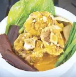  ??  ?? Kare-Kare is beloved by all Filipinos, and meets all the criteria for a national dish. Though traditiona­l oxtail is pictured, beef shank would do as well, and is more readily available around the world.