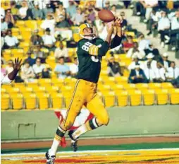  ?? Associated Press / NFL photos ?? Green Bay Packers wide receiver Max McGee makes a juggling touchdown catch during the first Super Bowl, a 35-10 victory over the Kansas City Chiefs in 1967.