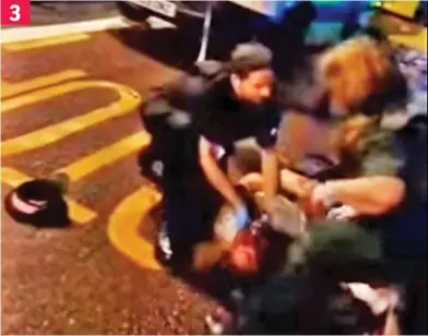  ??  ?? Bloodied: A police officer loses his hat in desperate struggle to help injured pedestrian 3