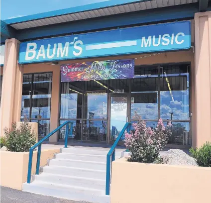  ?? JIM THOMPSON/JOURNAL ?? Baum’s Music, a local music shop, has been giving lessons and selling instrument­s since 1947.