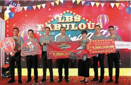  ?? ?? At LBS the Fabulous launch of Extra the
2022-23 campaign:
(From left)
MBG Bhd executive director and CEO Datuk Richard Lim,
LBS Bina Group deputy CEO
Datuk Seri Barry Lim Hock Seong,
LBS Bina Group managing director and CEO Datuk Wira Joey Lim Hock Guan,
LBS Bina Group executive chairman Tan Sri Lim Hock San,
LBS Bina Group executive director Datuk Cynthia Lim, LBS Bina Group deputy CEO Lucas Lim Kim Kiat, MGB Bhd deputy CEO Isaac Lim.