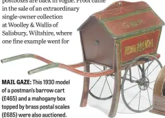  ?? ?? MAIL GAZE: This 1930 model of a postman’s barrow cart (£465) and a mahogany box topped by brass postal scales (£685) were also auctioned.