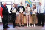  ??  ?? From left, John A. Coleman Catholic High School Latin teacher Ed Tobin, students Sara Jeiter-Johnson, Nathaniel Mitzel, Sydney Flood and Emma Dentico, and Principal James Lyons.