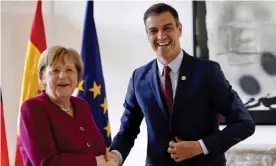  ?? Photograph: Reuters ?? The German chancellor, Angela Merkel, and Spain’s acting prime minister, Pedro Sánchez, meet in Brussels.