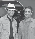  ?? GETTY IMAGES ?? Jonathan Bennett, right, and his love, former “Amazing Race” contestant Jaymes Vaughan in 2019 in Los Angeles. Bennett stars in “The Christmas House.