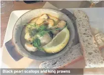  ??  ?? Black pearl scallops and king prawns