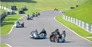  ?? ?? More recent sidecar action from Cadwell Park. [Photo by Joe Dick]