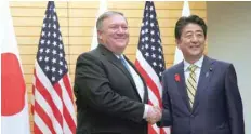  ?? — Reuters ?? US Secretary of State Mike Pompeo with Japanese Prime Minister Shinzo Abe in Tokyo on Saturday.