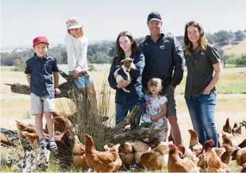  ?? PHOTO: ADAM MCGRATH ?? HOME RANGE: Craig and Theresa Robinson run BumNuts Australia at Gunning, NSW, pictured with their children, from left, William, Emily, Chloe and Ayla.