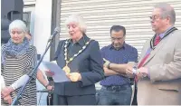  ??  ?? Bridgend County Borough Mayor Pamela Davies addresses the crowd. Also pictured are, Madeleine Moon and, from right, Tudor Davies and Suleman Hawas